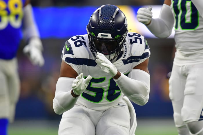 Brooks celebrates a big play during a game against the Los Angeles Rams.